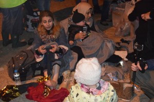 Female refugee just reached Lesvos and being looked after by volunteers and life guards