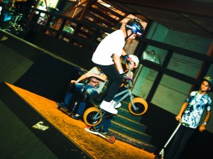Kids showing their Rocker Mini BMX tricks in front of the Pros at Rush Skate Park